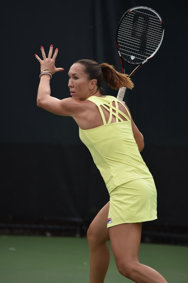 Goddess Strappy Back Tank ($64) and Goddess Zip Slit Skort ($64)