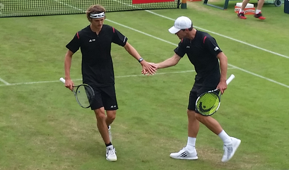 Alexander Zverev alongside Mischa Zverev during their doubles match.